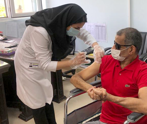 تزریق واکسن کرونا خارگ